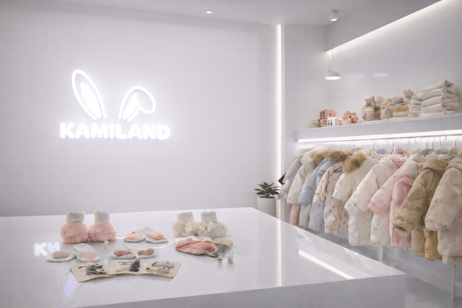 KAMILAND showroom with premium baby clothing displays
